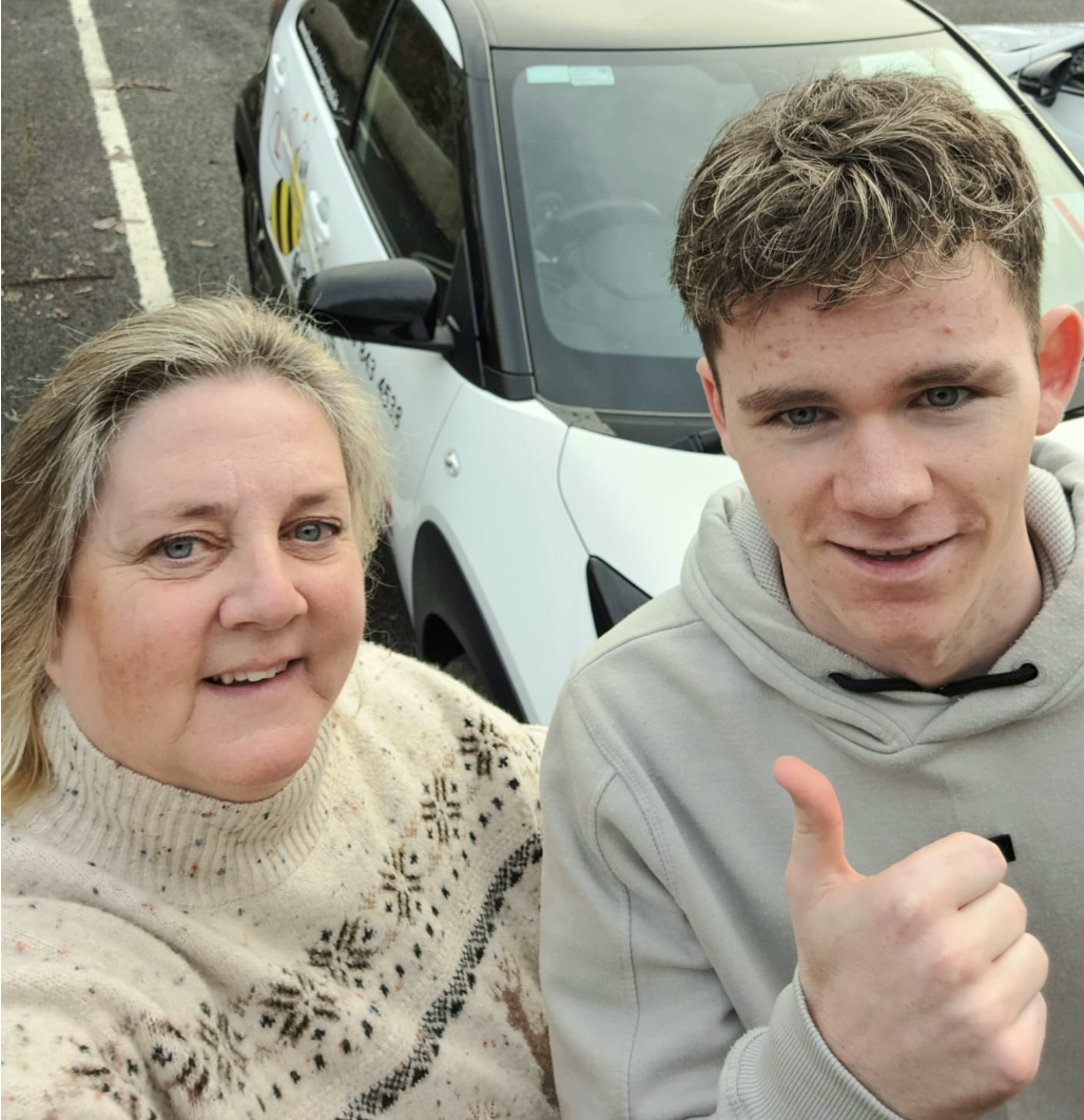 Bee Safe Driving School student and Vicki taking a celebratory selfie after a first-time pass