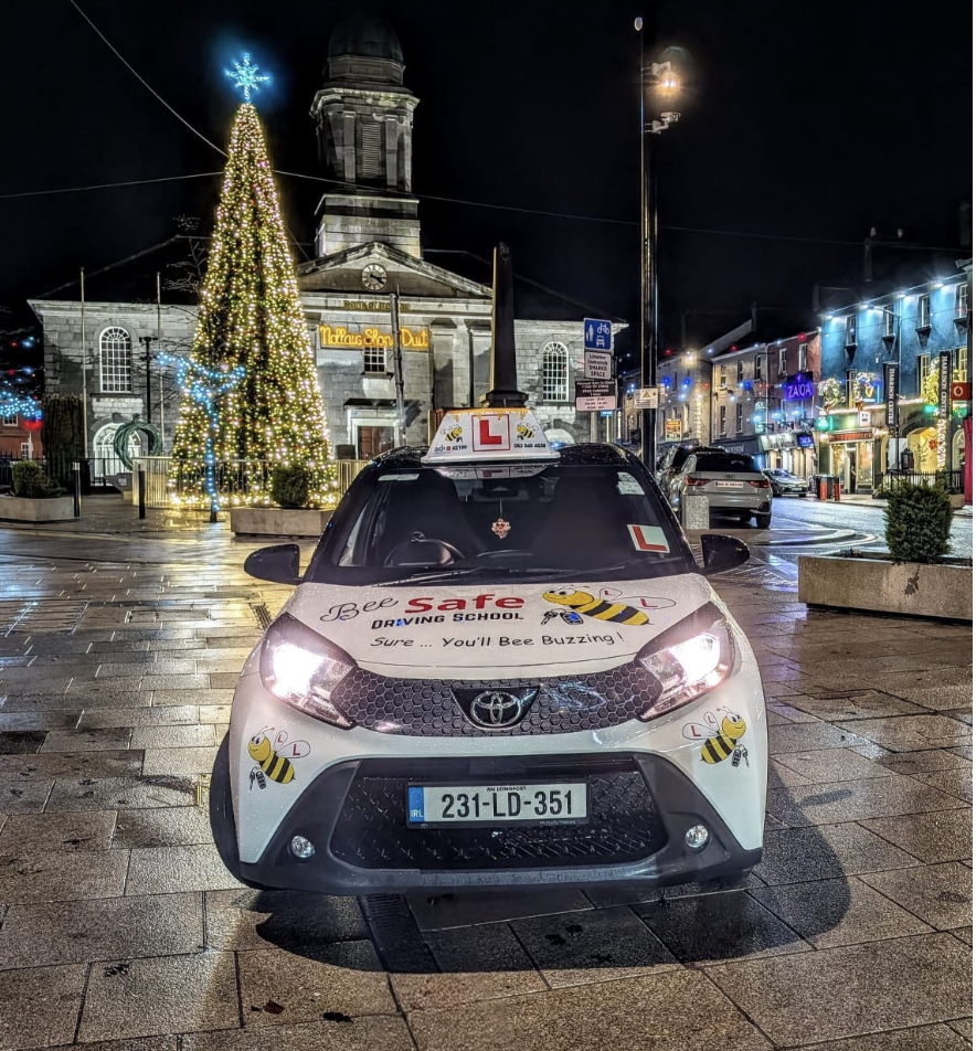 Bee — Bee Safe Driving School Toyota Aygo manual tuition car with bee livery in Roscommon town square